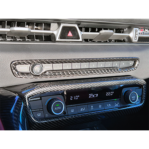 Rexpeed Dry Carbon Central Volume/CD/Switch Panel Trim Cover | 2020-2026 Toyota GR Supra (TS81)